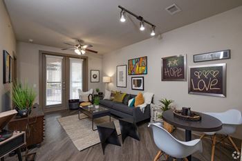 a living room with a couch and a table